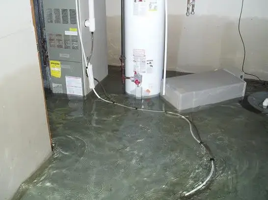Water spreading from a failed water heater in a Metairie utility space